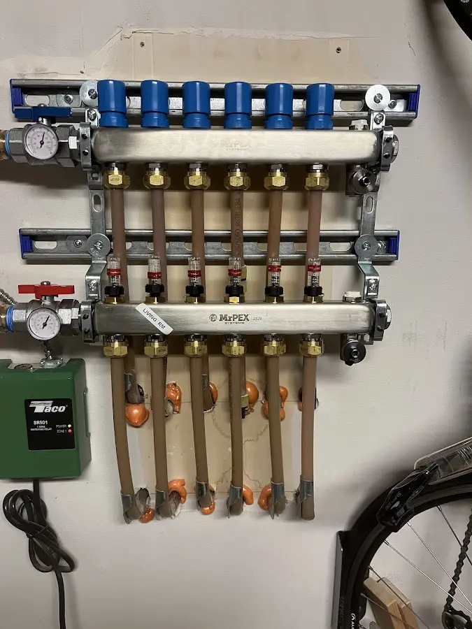 Plumber performing Water Heater Repair at a residential property in Waite Park